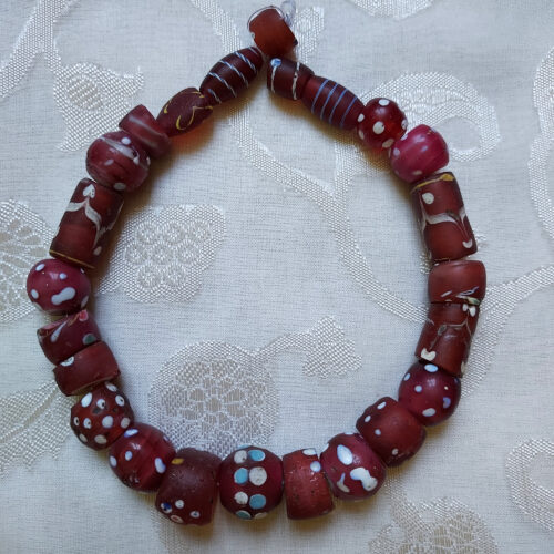 Antique Venetian red eye beads from the African trade.