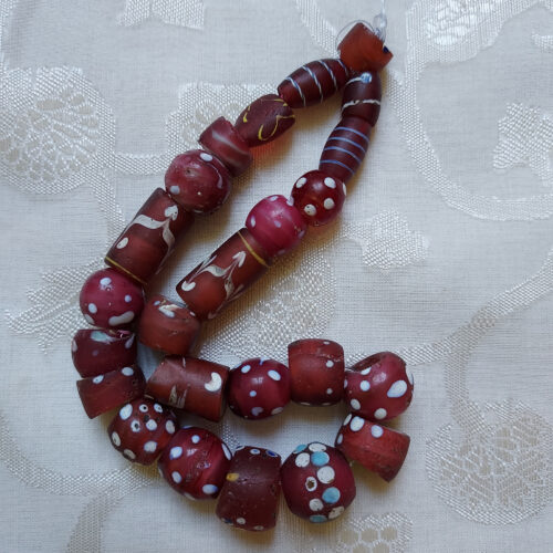 Antique Venetian red eye beads from the African trade.