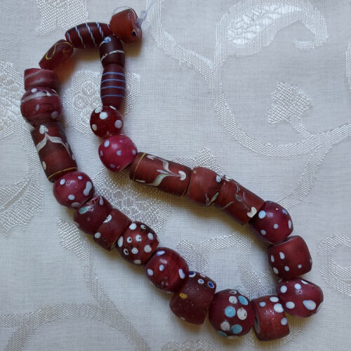 Antique Venetian red eye beads from the African trade.