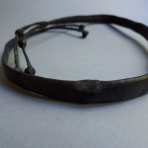 Bambara leather amulet belt with sacred grigris.