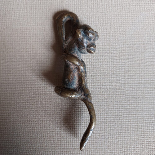 Lobi bronze amulet pendant of a figure from Burkina Faso.