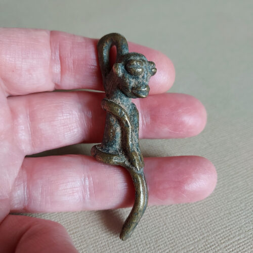 Lobi bronze amulet pendant of a figure from Burkina Faso.