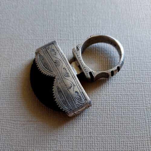 Tuareg statement ring with half moon dark stone from Mali.