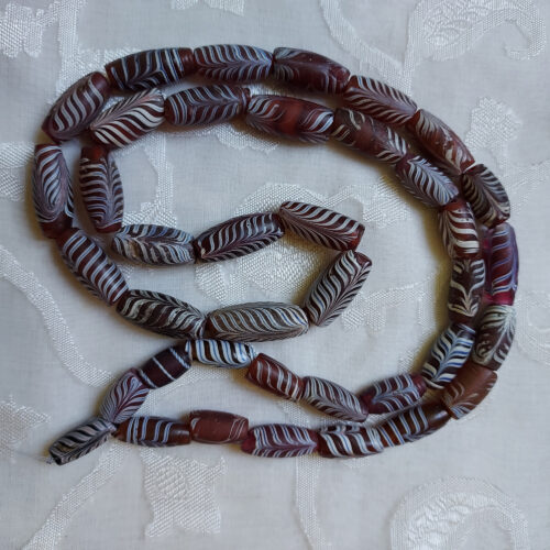 Antique Venetian feather beads from Mali.