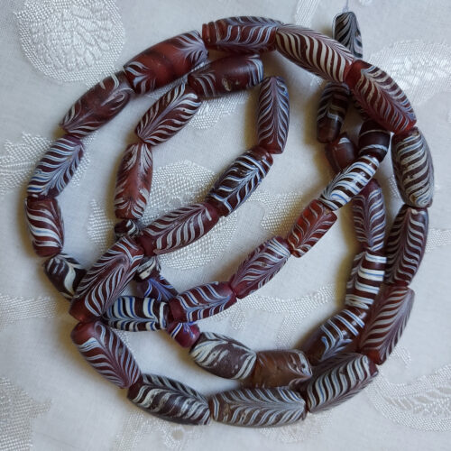 Antique Venetian feather beads from Mali.