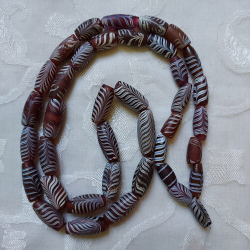 Antique Venetian feather beads from Mali.