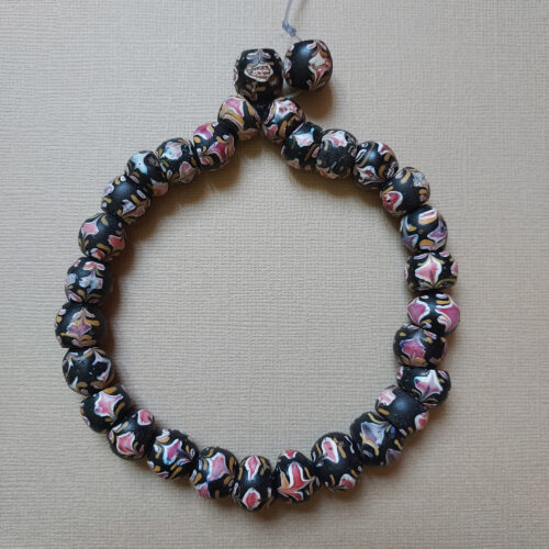 Venetian fancy beads trade beads with floral trailed decoration.