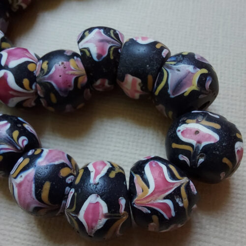 Venetian fancy beads trade beads with floral trailed decoration.