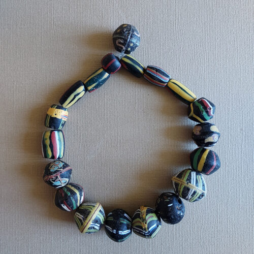 Antique Venetian bicone and stripe glass beads.