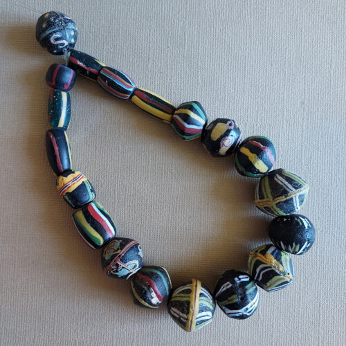 Antique Venetian bicone and stripe glass beads.