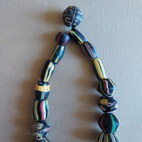 Antique Venetian bicone and stripe glass beads.