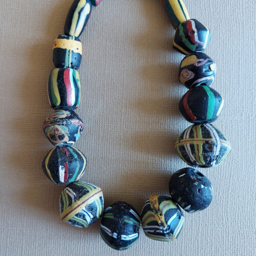 Antique Venetian bicone and stripe glass beads.