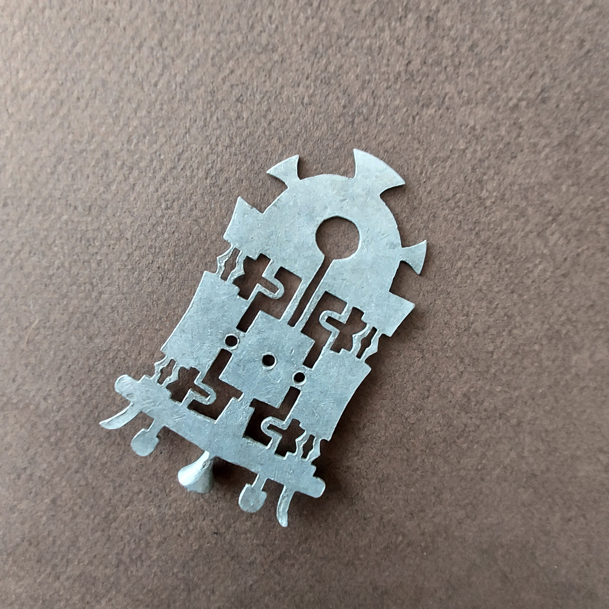 decorative aluminium plaque or adornment from Africa