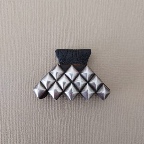 silver and leather hand of fatima pendant