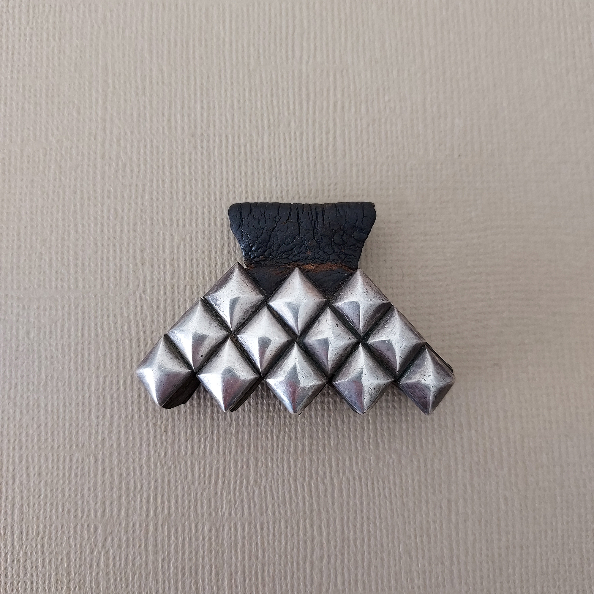 silver and leather hand of fatima pendant