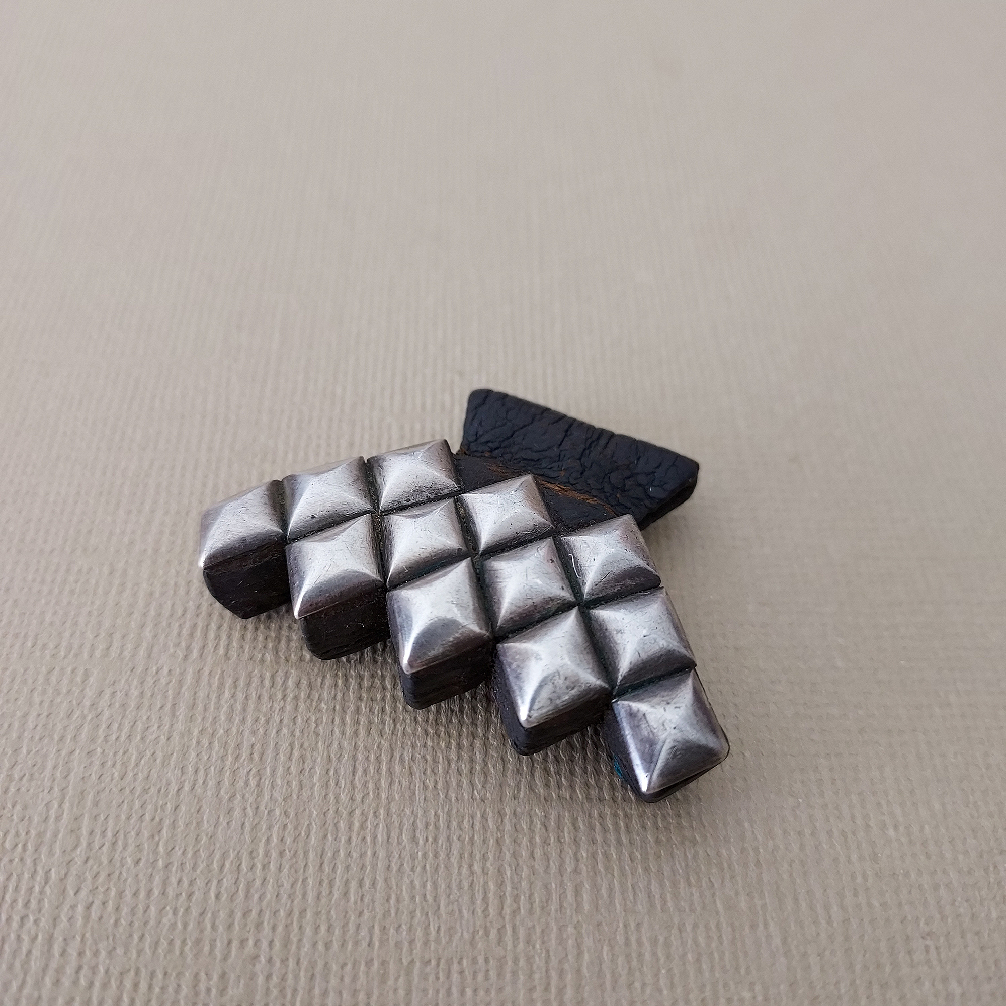 silver and leather hand of fatima pendant