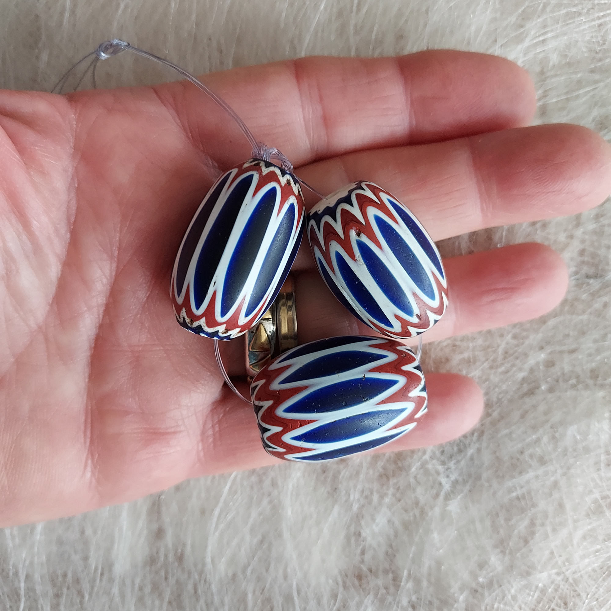 Three Venetian six layer chevron beads