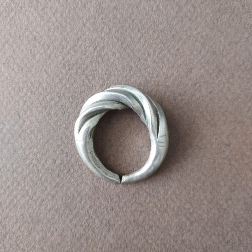 old silver ring with twist pattern