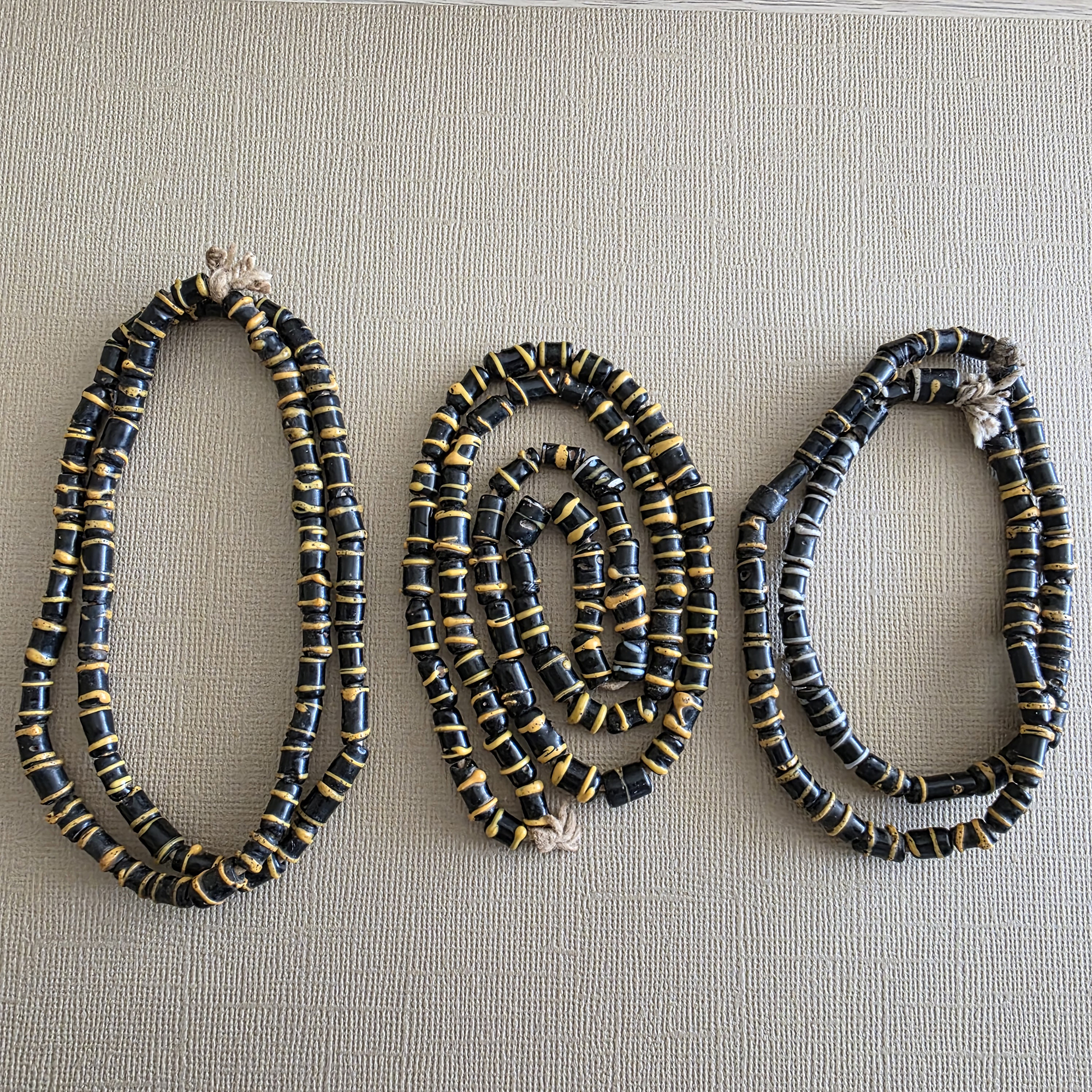 Small antique cylinder beads