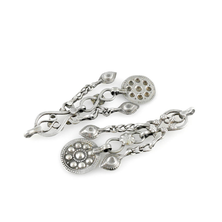 Afghan silver tribal pendants with dangles.