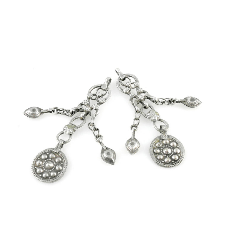 Afghan silver tribal pendants with dangles.