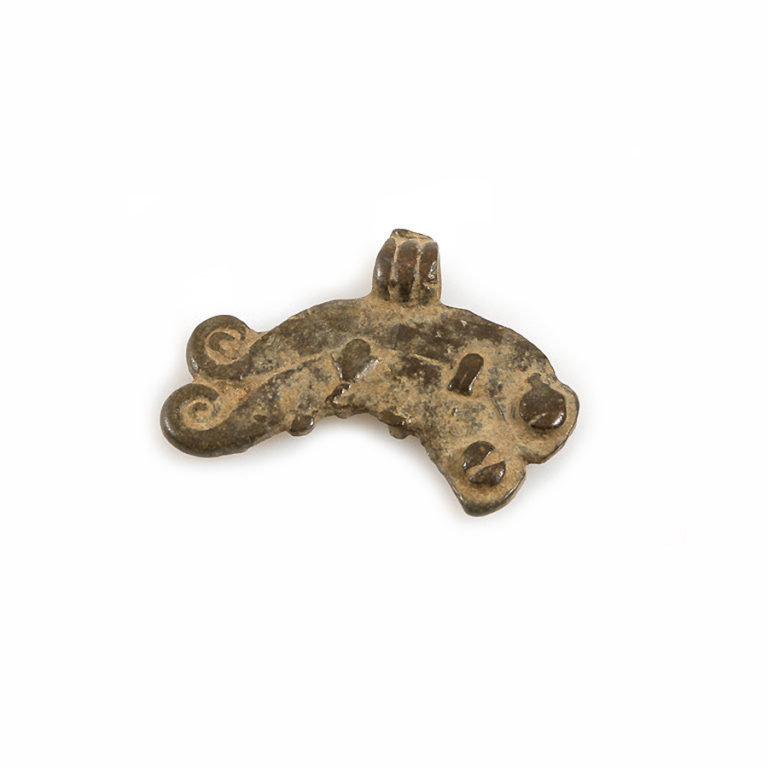 Old tribal amulet pendant of mating chameleons.