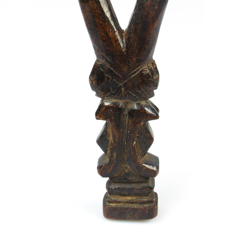 Dogon wood slingshot with twin figures from Mali.